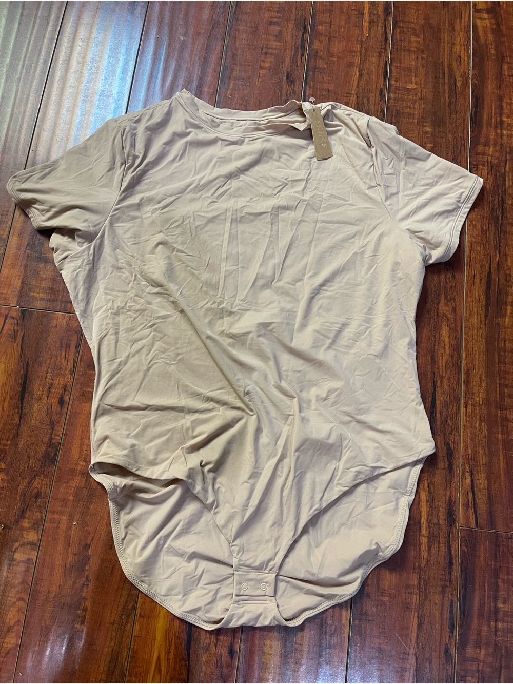SKIMS Short Sleeve Crewneck Bodysuit in Light Taupe